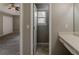 The bedroom features a pass-through to the Primary bath and a make up vanity at 4995 Panola Mill Dr, Lithonia, GA 30038