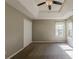 Bright bedroom featuring a double door closet and large window for ample light at 4995 Panola Mill Dr, Lithonia, GA 30038
