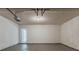 Bright garage with an entrance and a practical layout, illuminated by a central light fixture at 4995 Panola Mill Dr, Lithonia, GA 30038