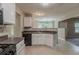 Functional kitchen with white cabinetry, dark countertops, and essential appliances for cooking at 4995 Panola Mill Dr, Lithonia, GA 30038