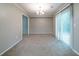 This dining room has lots of open space and sliding glass doors at 744 Brittany Ct, Stone Mountain, GA 30083