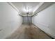 Spacious single car garage with a concrete floor and an automatic door at 744 Brittany Ct, Stone Mountain, GA 30083