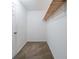 Empty walk-in closet featuring neutral carpet and a shelf at 744 Brittany Ct, Stone Mountain, GA 30083