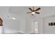 Bright bedroom with tray ceiling and a ceiling fan with a light at 2480 Ashbourne Dr, Lawrenceville, GA 30043