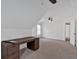 Bedroom with a ceiling fan and a desk at 2480 Ashbourne Dr, Lawrenceville, GA 30043