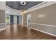 Living room with hardwood floors, chair rail, and recessed lighting at 2480 Ashbourne Dr, Lawrenceville, GA 30043
