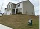 Charming two-story home with a two-car garage and professionally landscaped yard at 330 Cotton Tail Ln, Villa Rica, GA 30180