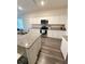 Modern kitchen featuring granite countertops, stainless steel appliances, and ample cabinet space at 330 Cotton Tail Ln, Villa Rica, GA 30180
