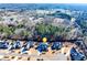 Discover this inviting neighborhood with meticulously landscaped yards from an aerial perspective at 4960 Shade Creek Xing, Cumming, GA 30028