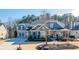 Charming two-story home with a welcoming front porch and well-maintained landscaping at 4960 Shade Creek Xing, Cumming, GA 30028