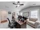 Functional home office featuring a desk, comfortable chair, and plenty of natural light at 4960 Shade Creek Xing, Cumming, GA 30028