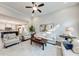 Bright and airy living room with high ceilings, hardwood floors, and an open layout to the modern kitchen at 4960 Shade Creek Xing, Cumming, GA 30028