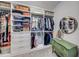 Organized walk-in closet with custom shelving, drawers, and ample space for all your wardrobe needs at 4960 Shade Creek Xing, Cumming, GA 30028
