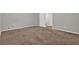 Bedroom featuring neutral paint and carpet, with ample space for a bed and furniture at 5309 Ashley Se Dr, Conyers, GA 30094