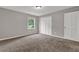 Bedroom has carpet, closet, and natural light at 5309 Ashley Se Dr, Conyers, GA 30094