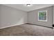 Bedroom with carpet and natural light coming in through the window at 5309 Ashley Se Dr, Conyers, GA 30094
