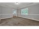 Comfortable living area featuring neutral walls and floors and natural light at 5309 Ashley Se Dr, Conyers, GA 30094