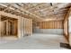 Large unfinished basement shows exposed wood framework and insulated ceiling at 6265 Bellmoore Park Ln, Johns Creek, GA 30097