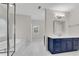 Luxurious bathroom with tub, large vanity, and plenty of counter space at 6265 Bellmoore Park Ln, Johns Creek, GA 30097