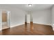 This bedroom features multiple closets and an ensuite bathroom at 6265 Bellmoore Park Ln, Johns Creek, GA 30097