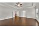 Spacious main bedroom boasts hardwood floors, tray ceiling, and lots of natural light at 6265 Bellmoore Park Ln, Johns Creek, GA 30097