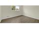 Bedroom featuring wood floors, neutral paint, and one window at 6470 Windsor Dr, Acworth, GA 30102