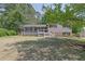 Charming two-story home with a welcoming front porch and well-manicured lawn in a quiet neighborhood at 6470 Windsor Dr, Acworth, GA 30102