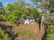 Aerial view of a charming home surrounded by mature trees and lush greenery, providing a private and peaceful setting at 1825 Sw Willis Mill Rd, Atlanta, GA 30311
