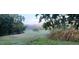 Scenic golf course view with lush green fairways and mature trees, offering a serene and picturesque setting at 1825 Sw Willis Mill Rd, Atlanta, GA 30311