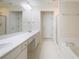 Bright bathroom with double vanity, soaking tub, and separate shower at 4205 Royal Regency Nw Cir, Kennesaw, GA 30144