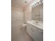 Bathroom featuring a shower and tub combination with a single sink vanity at 4205 Royal Regency Nw Cir, Kennesaw, GA 30144