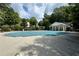 View of the neighborhood pool with pool house during the off-season at 4205 Royal Regency Nw Cir, Kennesaw, GA 30144