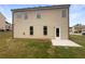 Large backyard with a patio and ample lawn space perfect for entertaining or outdoor activities at 4452 Belcamp Rd, Fairburn, GA 30213