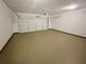 Spacious two-car garage with ample room for parking and storage at 4452 Belcamp Rd, Fairburn, GA 30213