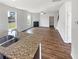 Kitchen featuring granite countertops, stainless steel appliances, and a seamless flow to the living area at 4452 Belcamp Rd, Fairburn, GA 30213