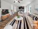 Bright living room with a contemporary design, stylish furnishings and an open concept layout at 4452 Belcamp Rd, Fairburn, GA 30213