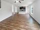 Spacious living room features hardwood floors and an open-concept layout, perfect for entertaining at 4452 Belcamp Rd, Fairburn, GA 30213