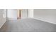 Large bedroom features one window, neutral paint, and plush carpeting at 173 Soseby Lake Ln, Grayson, GA 30017