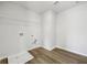 The laundry room is bright with vinyl floors and lots of space at 173 Soseby Lake Ln, Grayson, GA 30017