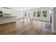 Open concept kitchen and living area with ample windows and natural light at 173 Soseby Lake Ln, Grayson, GA 30017