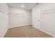Walk-in closet with carpet, shelving and white door at 366 Tallulah Ln, Grayson, GA 30017