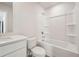 Bright bathroom featuring a shower-tub combination and single sink vanity with quartz countertop at 376 Tallulah Ln, Grayson, GA 30017