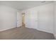 Bedroom featuring neutral carpet, and a doorway leading to the ensuite bathroom at 376 Tallulah Ln, Grayson, GA 30017