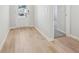 Bright entryway featuring wood-look floors and a view of the front door at 376 Tallulah Ln, Grayson, GA 30017