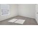 Bedroom featuring neutral carpet with a window that provides natural light at 371 Tallulah Ln, Grayson, GA 30017