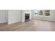 Spacious living room features a fireplace and large windows that provide ample natural light at 371 Tallulah Ln, Grayson, GA 30017