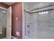 Bathroom featuring a tub and shower combination with stylish white subway tiles at 4507 N Peachtree Rd, Dunwoody, GA 30338