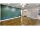 Spacious bedroom with hardwood flooring, a closet and recessed lighting at 4507 N Peachtree Rd, Dunwoody, GA 30338