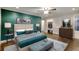 A beautifully decorated bedroom with modern furnishings, large windows, and a private closet at 4507 N Peachtree Rd, Dunwoody, GA 30338