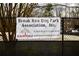 Brook Run Dog Park Association sign at the entrance to the community dog park at 4507 N Peachtree Rd, Dunwoody, GA 30338